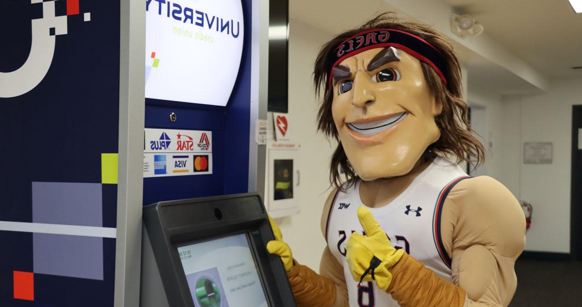 Gideon the mascot at the University Credit Union ATM